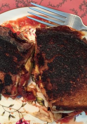 A picture of Mozzarella, Avocado, And Salsa Grilled Cheese.
