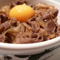 A picture of Kansai-Style Sukiyaki Beef Bowl Onions Galore.
