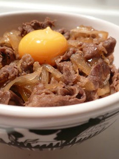 A picture of Kansai-Style Sukiyaki Beef Bowl Onions Galore.