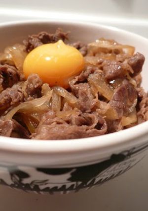 A picture of Kansai-Style Sukiyaki Beef Bowl Onions Galore.