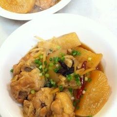 A picture of Chinese-style Braised Chicken Drumettes with Daikon Radish and Star Anise.