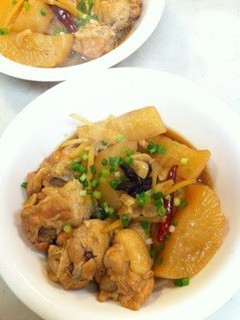 A picture of Chinese-style Braised Chicken Drumettes with Daikon Radish and Star Anise.
