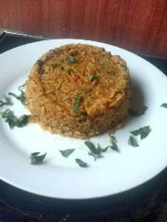A picture of Traditional jollof rice with locust beans.
