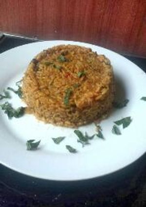 A picture of Traditional jollof rice with locust beans.
