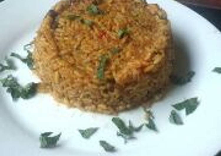 Traditional jollof rice with locust beans