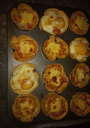 Una foto de Mini tartitas de calabaza, choclo, queso y huevo