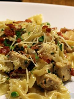 A picture of Chicken and Farfalle Pasta in a Roasted Garlic Cream Sauce.