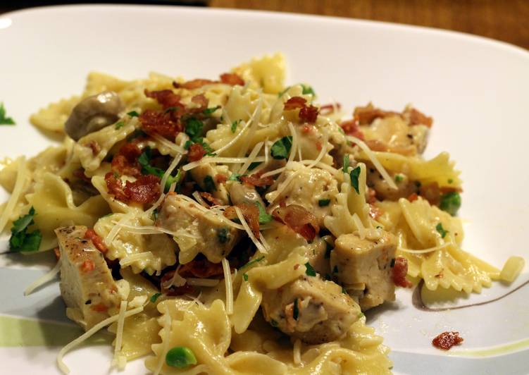 Chicken and Farfalle Pasta in a Roasted Garlic Cream Sauce Chicken and Farfalle Pasta in a Roasted Garlic Cream Sauce