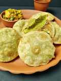 Koraishutir Kochuri/Green Peas Kachori and aloo dum