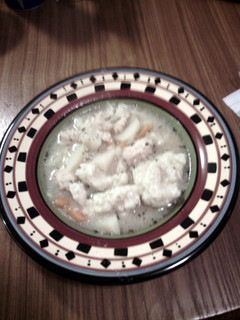 A picture of chicken and dumplings.