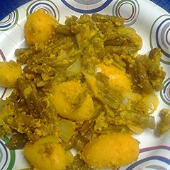 A picture of Green beans, potatoes, and cheese.