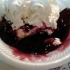 A picture of Blueberry mango on cake.