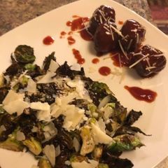 A picture of Brussels and meatballs air fried.