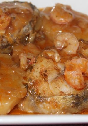 A picture of Fresh Cod with Shrimp in Sauce.