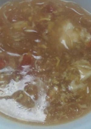 A picture of Egg, Tomato, and Malony Noodle Soup.