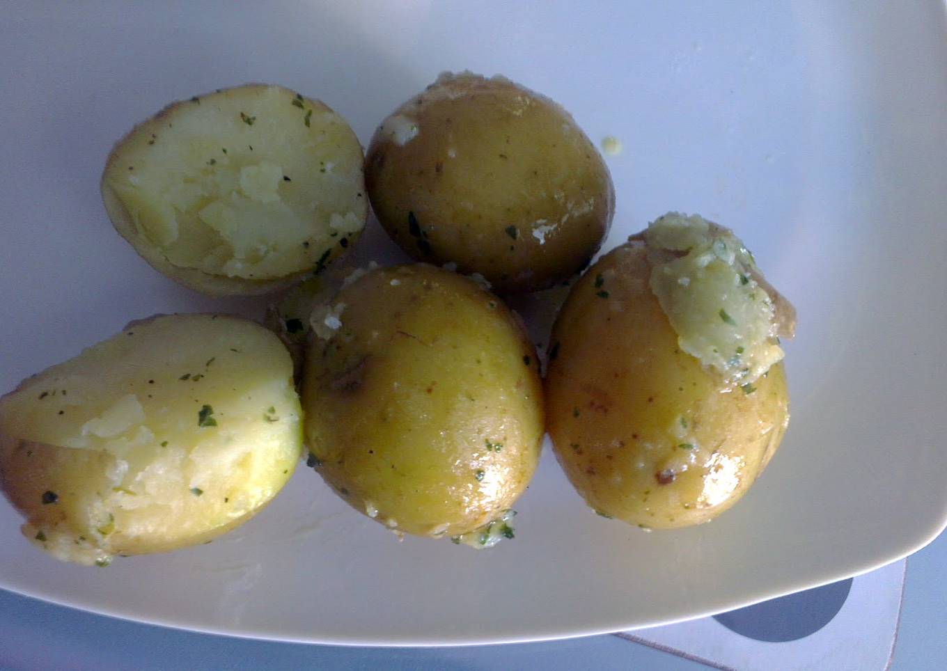 Baby new potatoes in herb butter
