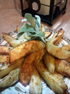 A picture of Roasted potato wedges.