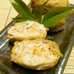 A picture of Inari Sushi with a Twist - Spicy Inari Sushi.