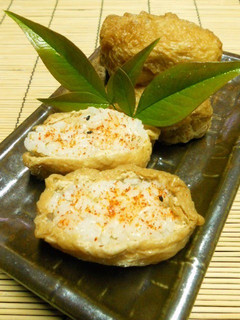 A picture of Inari Sushi with a Twist - Spicy Inari Sushi.