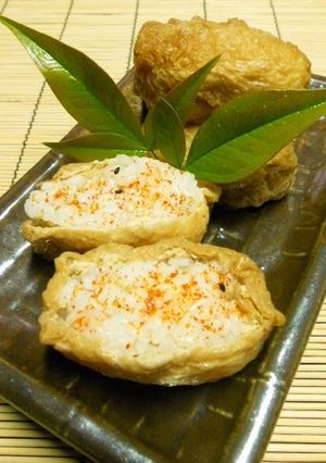 A picture of Inari Sushi with a Twist - Spicy Inari Sushi.