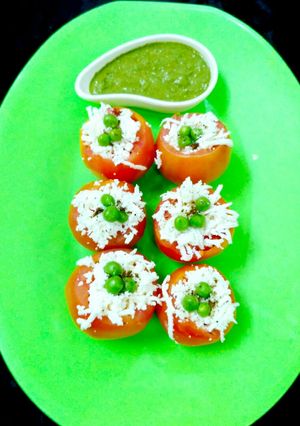 A picture of Tricolour Stuffed Tomatoes.
