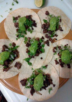 A picture of how to prepare beef for carne asada tacos.