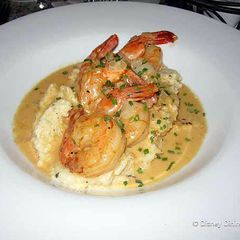 A picture of Gumbo And Cheese Grits.