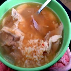 A picture of thanksgiving turkey and rice soup.