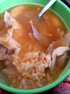 A picture of thanksgiving turkey and rice soup.