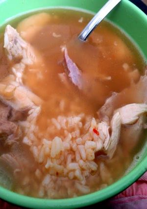 A picture of thanksgiving turkey and rice soup.