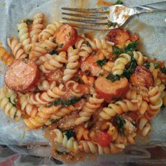 A picture of Lamb and sausage pasta.