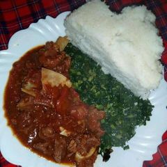 Ugali Beef and sukuma A picture of Ugali Beef and sukuma.