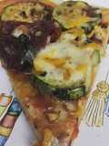 Pizza de zucchini y  tomates secos