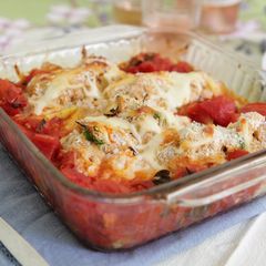 A picture of Roasted Summer Squash Boats Filled with Chicken and Ricotta Topped with Fresh Garlic Tomato Sauce.
