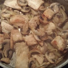 A picture of Chicken with mushrooms and onions.