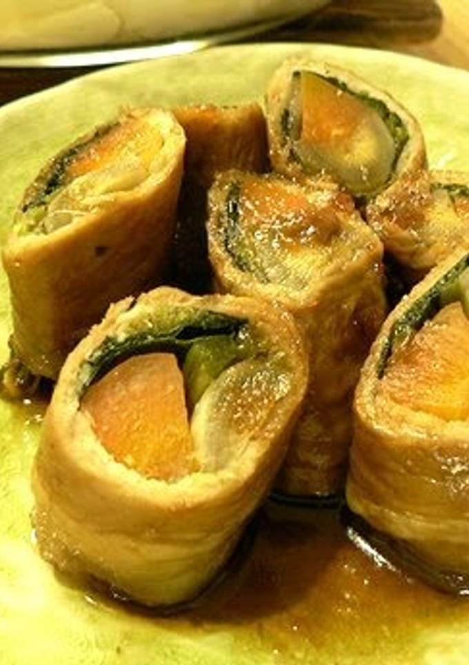 A picture of Burdock Root and Carrot Hachiman Rolls with Pork.