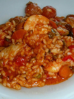 Una foto de Arroz meloso de langostinos y rape con hortalizas