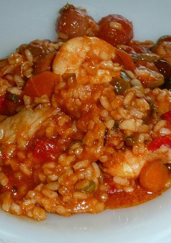 Una foto de Arroz meloso de langostinos y rape con hortalizas