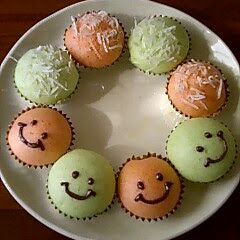 A picture of Steamed Bread Smileys with Shaved Ice Syrup.