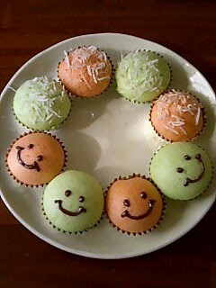 A picture of Steamed Bread Smileys with Shaved Ice Syrup.