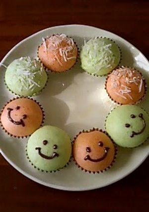 A picture of Steamed Bread Smileys with Shaved Ice Syrup.