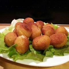A picture of AMIEs Mozzarella & Parmesan Fritters.