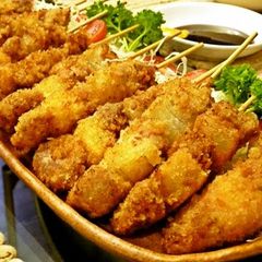 A picture of Showa-Style Homemade Fried Meat Skewers.