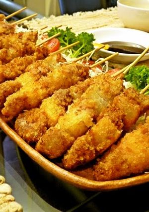 A picture of Showa-Style Homemade Fried Meat Skewers.