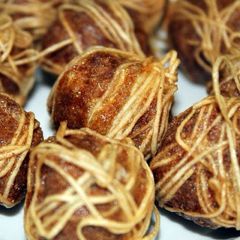 A picture of Deep Fried Meatball Wrapped With Noodle.