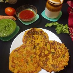 A picture of Vegetable Rice Tawa Cake.