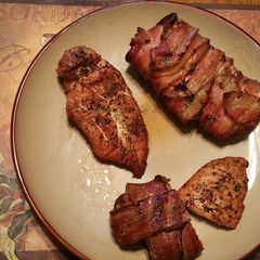 A picture of Smoked bacon wrapped chicken breast.