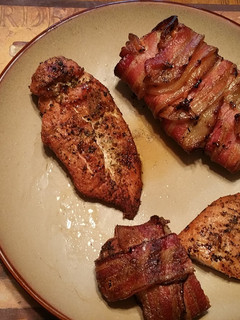A picture of Smoked bacon wrapped chicken breast.