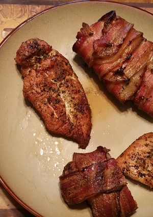A picture of Smoked bacon wrapped chicken breast.