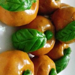 A picture of Sugar free orange mithai.